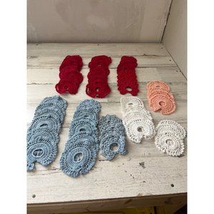 Set of 51 small circular crocheted doilies